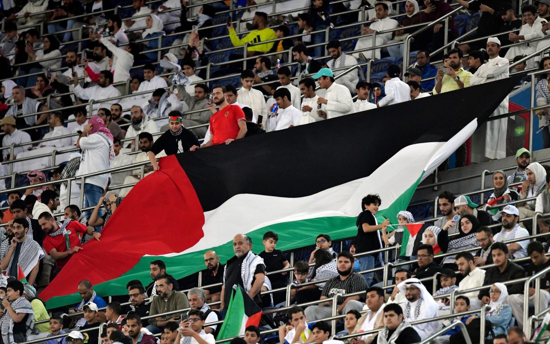 Palestinians and Supporters Fly Flags in an Emotional World Cup Qualifier